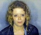 Natasha Lyonne appears in a Miami-Dade jail mug shot taken as she is booked August 28, 2001 after she was arrested in the early morning 