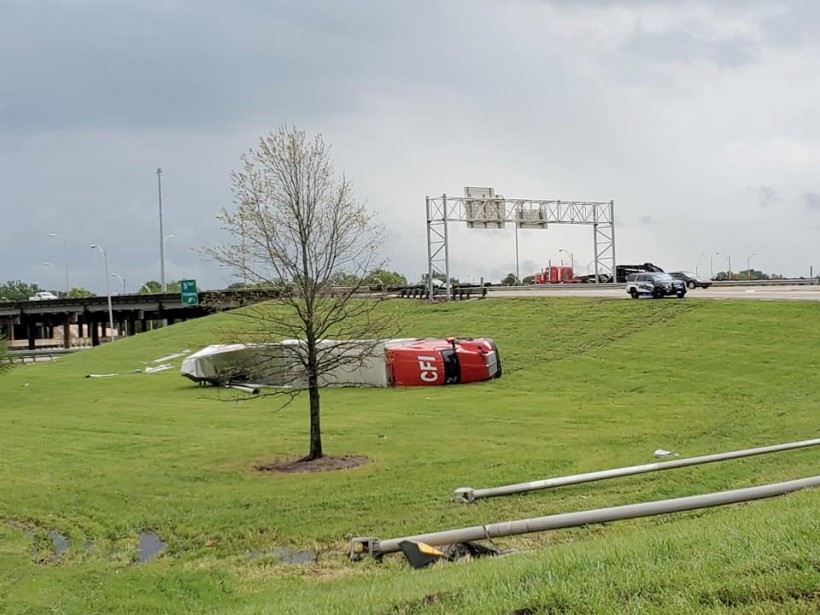 A truck flipped on its side is seen in the aftermath of a tornado in Monroe, Louisiana, U.S. April 12, 2020