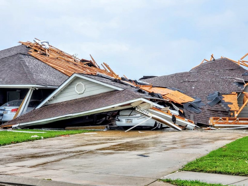 Damaged buildings and vehicles are seen in the aftermath of a tornado in Monroe, Louisiana, U.S. April 12, 2020