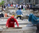 People construct burial vaults in the Angela Maria Canalis cemetery as the coronavirus disease (COVID-19) overwhelms sanitary authorities, in Guayaquil