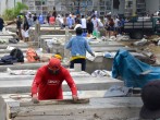 People construct burial vaults in the Angela Maria Canalis cemetery as the coronavirus disease (COVID-19) overwhelms sanitary authorities, in Guayaquil