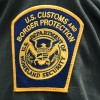 A U.S. Customs and Border Protection patch is seen on the arm of a U.S. Border Patrol agent 