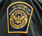 A U.S. Customs and Border Protection patch is seen on the arm of a U.S. Border Patrol agent 