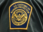 A U.S. Customs and Border Protection patch is seen on the arm of a U.S. Border Patrol agent 