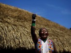 A kayapo woman shouts during a four-day pow wow in Piaracu village, in Xingu Indigenous Park, near Sao Jose do Xingu, Mato Grosso state, Brazil,