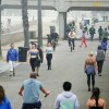 Cyclists and pedestrians travel up and down Huntington City Beach during the outbreak of the coronavirus disease (COVID-19) in Huntington Beach, California, U.S., April 25, 2020