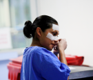 A nurse removes plasters from her face at the end of her shift inside the intensive care unit where patients with (COVID-19) are treated at Juarez hospital in Mexico City