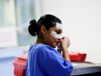 A nurse removes plasters from her face at the end of her shift inside the intensive care unit where patients with (COVID-19) are treated at Juarez hospital in Mexico City