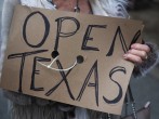 Protesters against the state's extended stay-at-home order demonstrate in Austin