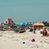 Sun-seekers return to the beach during a phased reopening in St. Pete Beach