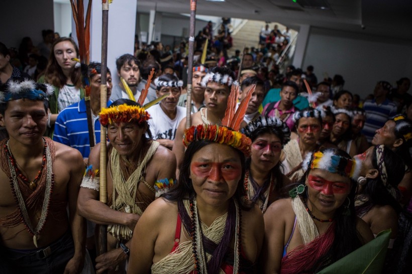 Ecuador's Waorani tribe waist outside a courtroom in the provincial court of Pastaza, Ecuador.