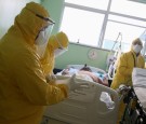 Nurses of Emergency Rescue Service (SAMU) prepare to transport a patient from an emergency health center to a hospital during the spread of the coronavirus disease (COVID-19) in Santo Andre, Sao Paulo State, Brazil.