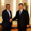Tedros Adhanom, director general of the World Health Organization, shakes hands with Chinese President Xi jinping before a meeting at the Great Hall of the People in Beijing