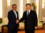 Tedros Adhanom, director general of the World Health Organization, shakes hands with Chinese President Xi jinping before a meeting at the Great Hall of the People in Beijing