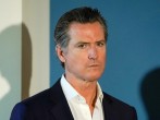 California governor Gavin Newsom waits to speak at a news conference in San Diego, California, U.S.