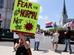 Trump supporters and others rally against coronavirus disease restrictions at the Pennsylvania Capitol in Harrisburg