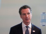 California Governor Gavin Newsom speaks to the media after at a voting center for the presidential primaries on Super Tuesday