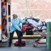 First responders load a patient into an ambulance from a nursing home where multiple people have contracted COID-19 on April 17, 2020 in Chelsea, Massachusetts. Chelsea has the highest concentration o