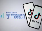 FILE PHOTO: Tik Tok logos are seen on smartphones in front of displayed ByteDance logo in this illustration