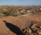 A U.S. Army National Guardsman overwatches the U.S.-Mexico border on June 22, 2011 in Nogales, Arizona.