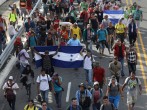 After Guatemalan Forces Break up Bigger Caravan, Some 3,000 U.S.-Bound Migrants Continue On