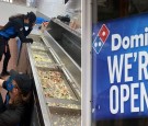 Viral Photo of Overworked Texas Dominos Workers Burdened by Snowstorm Goes Viral