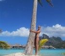Heidi Klum topless on the beach in Bora Bora