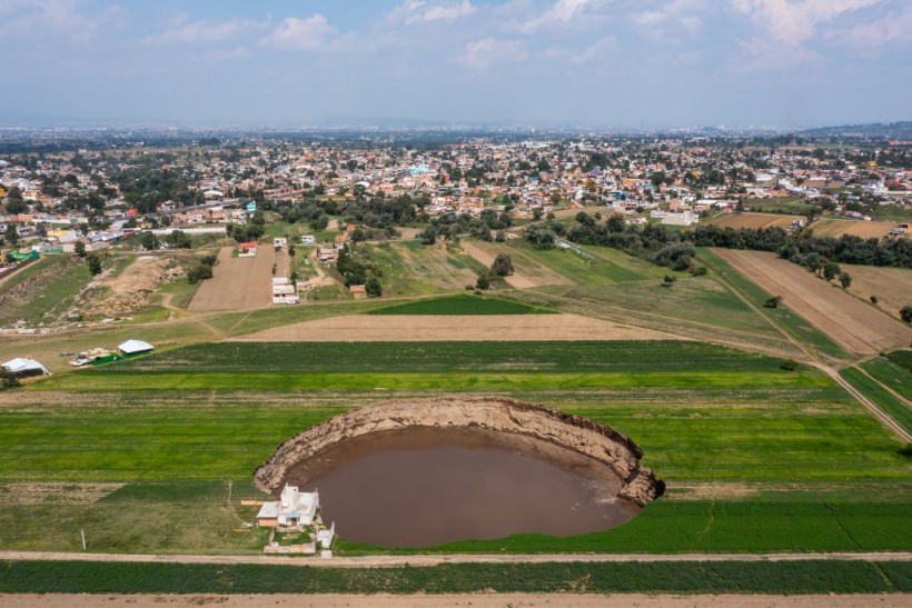 Mexico Sinkhole Now Larger Than a Football Field, Swallows House and Traps 2 Dogs