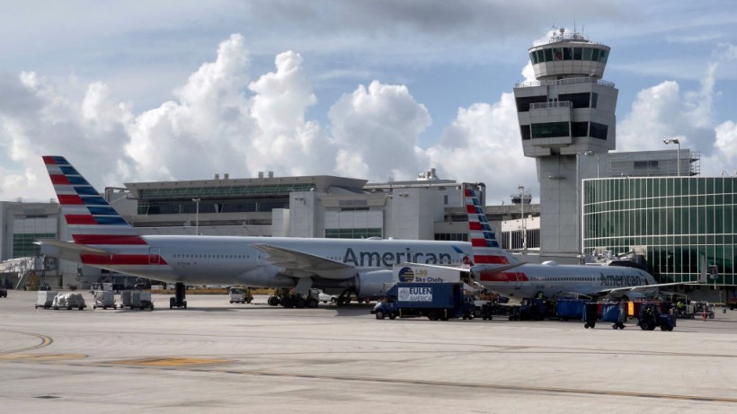 13-Year-Old American Airlines Passenger Seen in Video Being Duct-Taped to an Airplane Seat