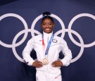 Simone Biles Supports Boyfriend Jonathan Owens While on Vacation