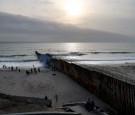 Migrants Huddle In Camps And Shelters In Tijuana Waiting To Cross Into U.S.