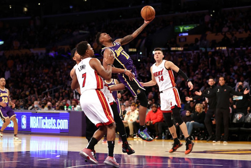 Shorthanded LA Lakers Take Down Miami Heat in Another OT Victory; Jimmy Butler Exits Game With Ankle Sprain