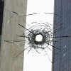 A hole in a window made by a stray bulle