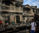 Smoke Comes out of House After Truck Exploded in Haiti 