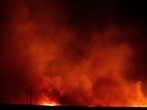New Mexico: Raging Wildfires Combine, Prompting Thousands of Evacuations in San Miguel County