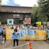 Tee McClenty, Executive Director, MN350, speaks at a rally in front of Jackson Lake Lodge, Aug 25, 2022