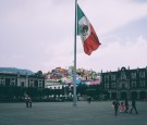 People Near Mexican Flag