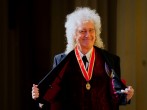 King Charles Knights Queen Guitarist Brian May in Buckingham Palace