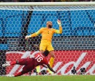 Portugal grab last-gasp equalizer to stay alive