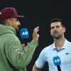 Nick Kyrgios (left) interviews 10-time Australian Open champ Novak Djokovic (right) after the latter's semifinal win at the tournament