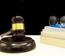 A law book with a gavel - domestic violence law