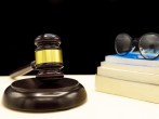A law book with a gavel - domestic violence law