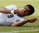 Suarez in bite furor, faces lengthy World Cup ban