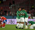 Players of Bolivia celebrate after winning the 2026 FIFA World Cup South American qualifiers football match against Chile 