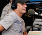 Anthony Cumia of the Opie & Anthony Show live on air at SiriusXM Studio on September 28, 2011 in New York City