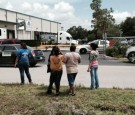 Naples packing plant back to work after raid