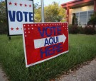 English-Spanish Signs Front Election Center In Texas