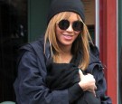 Beyonce-seen-in-West-Village-with-blue-ivy-covered-up.jpg