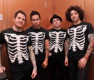 Drummer-And- Hurley-bassist-Pete-Wentz-vocalist/guitarist-Patrick-Stump-and-guitarist-Joe-Trohman-of-Fall-Out-Boy-pose-backstage