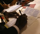 New American citizens register to vote 